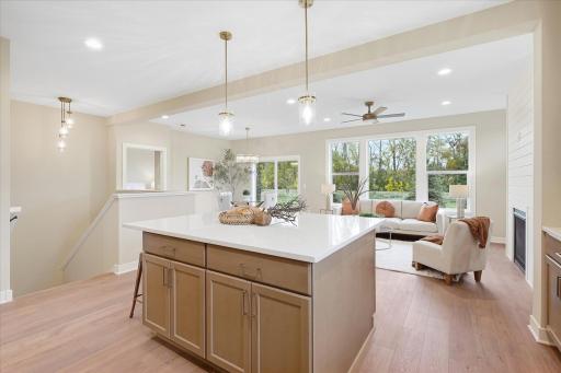 Large planked flooring throughout the main level.