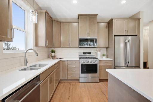 Stainless steel appliances and under-cabinet lighting.