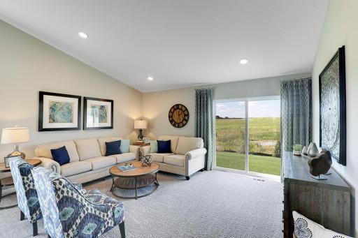 LED lighting and knockdown ceilings add to the comfort and appeal of your living room. Model home, color and finish will vary.