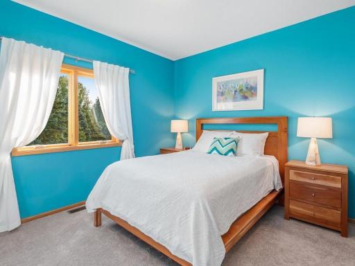 Main level Ensuite is separated from the Primary for guest privacy.