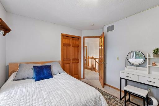 One of four bedrooms conveniently located together on the upper level.