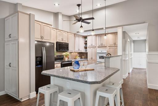 Beautifully updated cook's kitchen is the heart of the home