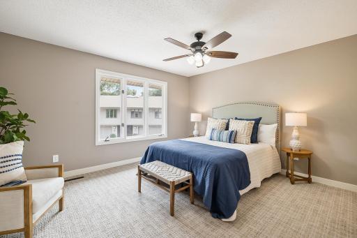 Primary bedroom with ensuite 3/4 bathroom and multiple closets!