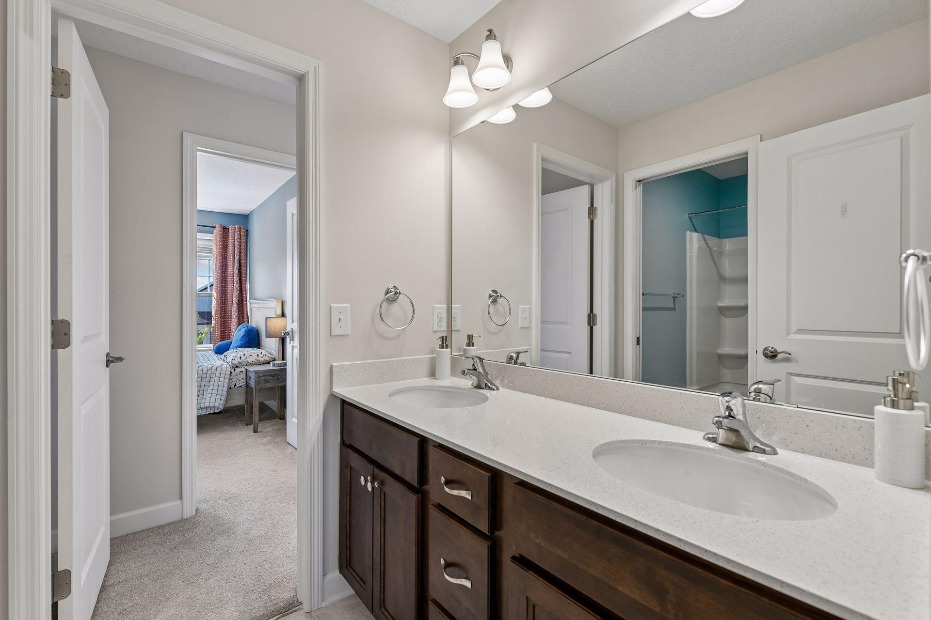 Two of the bedrooms share a full Jack-and-Jill bathroom.