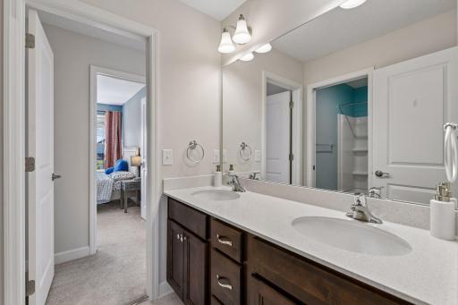Two of the bedrooms share a full Jack-and-Jill bathroom.