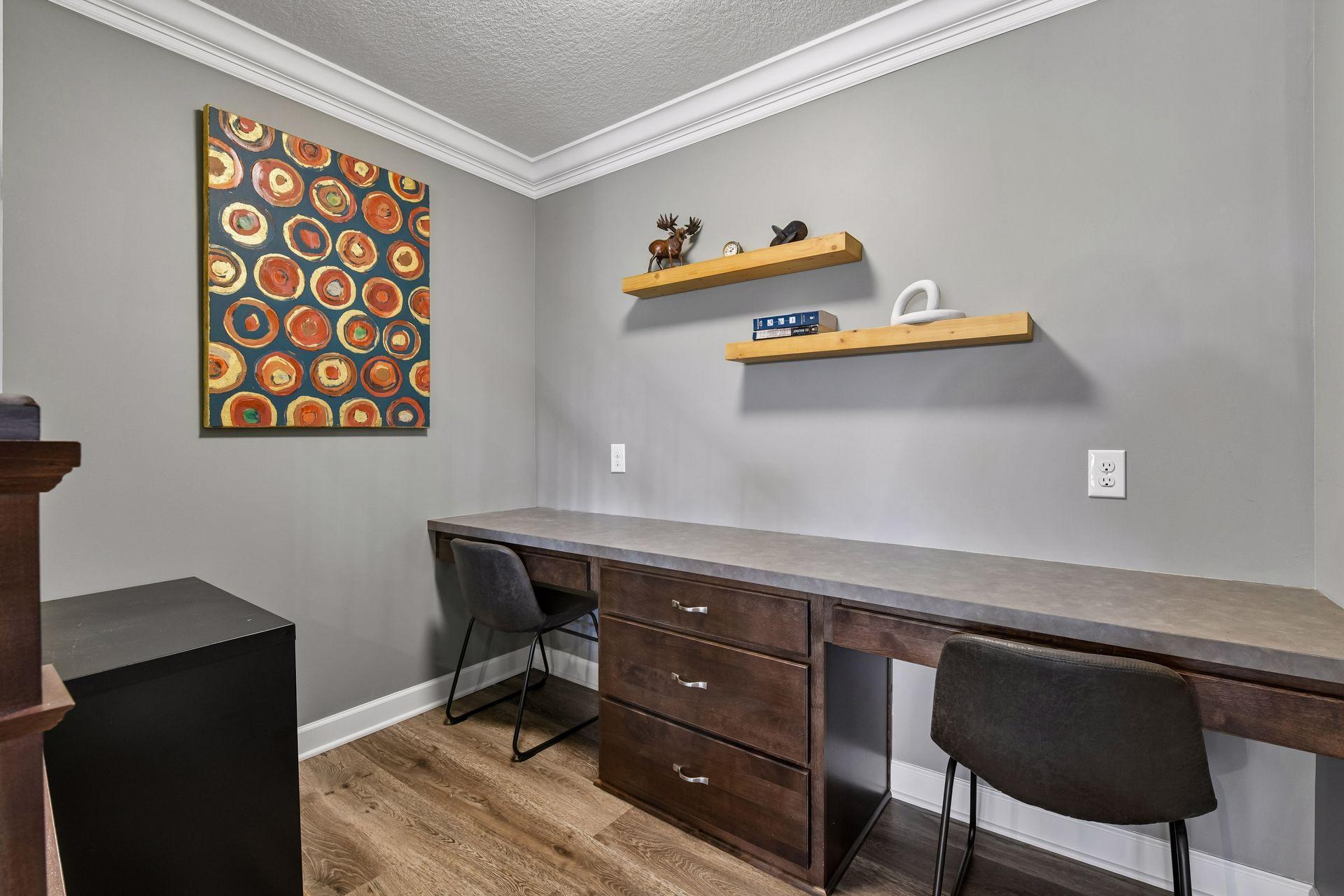 Nestled away on the main level is a convenient Pocket Office offering two workstations and built-in cabinetry - this is a great homework nook or space for projects.