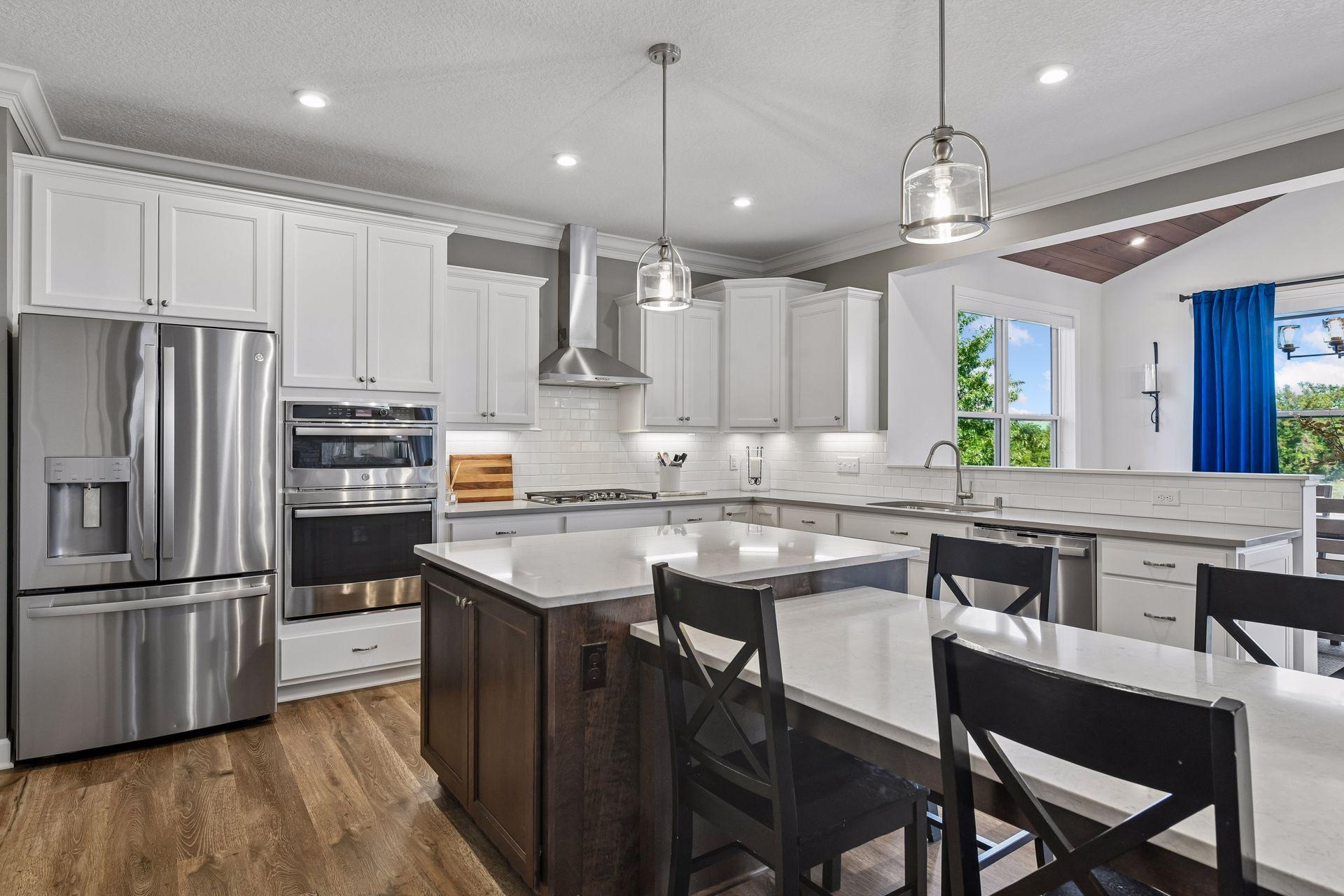 Enjoy quartz countertops, and stainless steel GE Profile appliances.