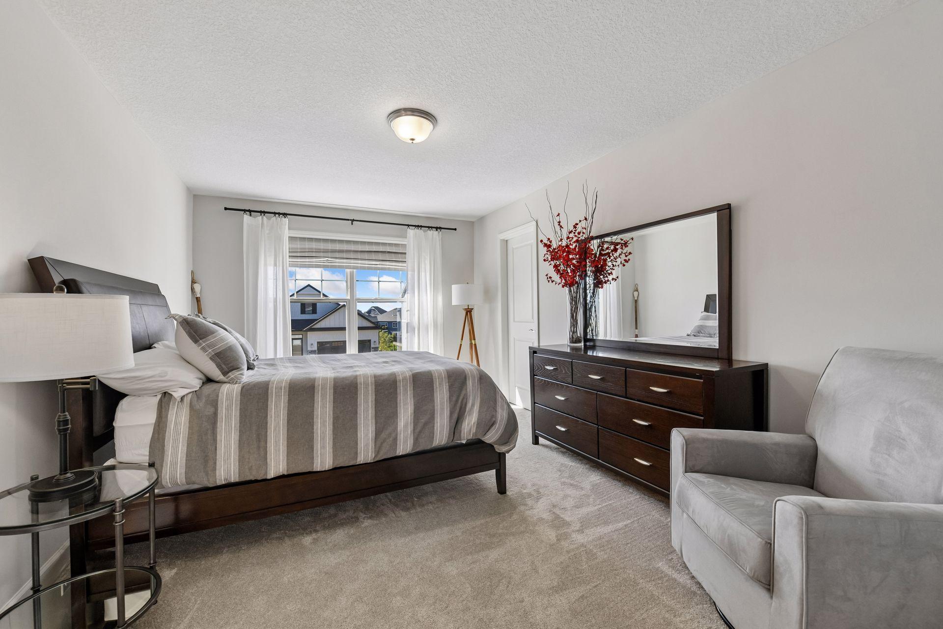 The fourth bedroom is a private suite with a large walk-in closet.