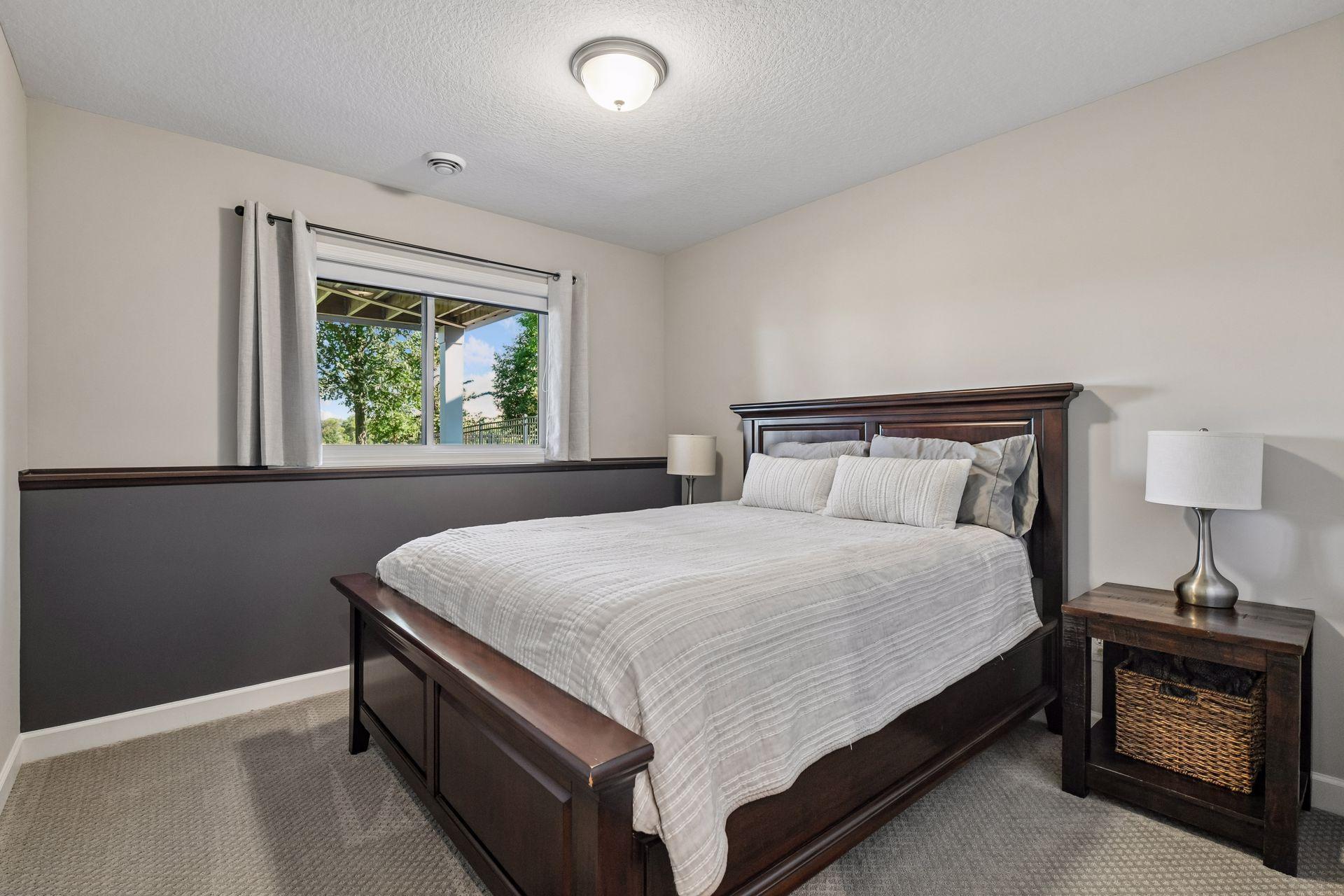 The Guest Bedroom offers a large walk-in closet and is perfect for overnight visitors.