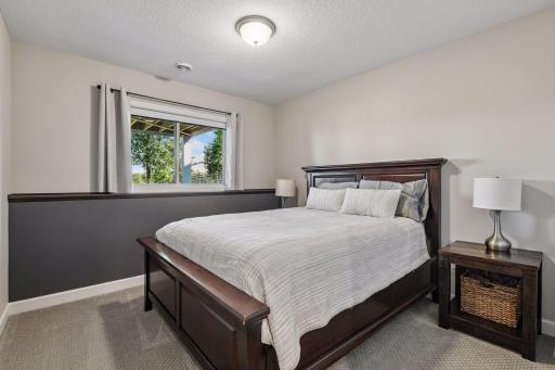 The Guest Bedroom offers a large walk-in closet and is perfect for overnight visitors.