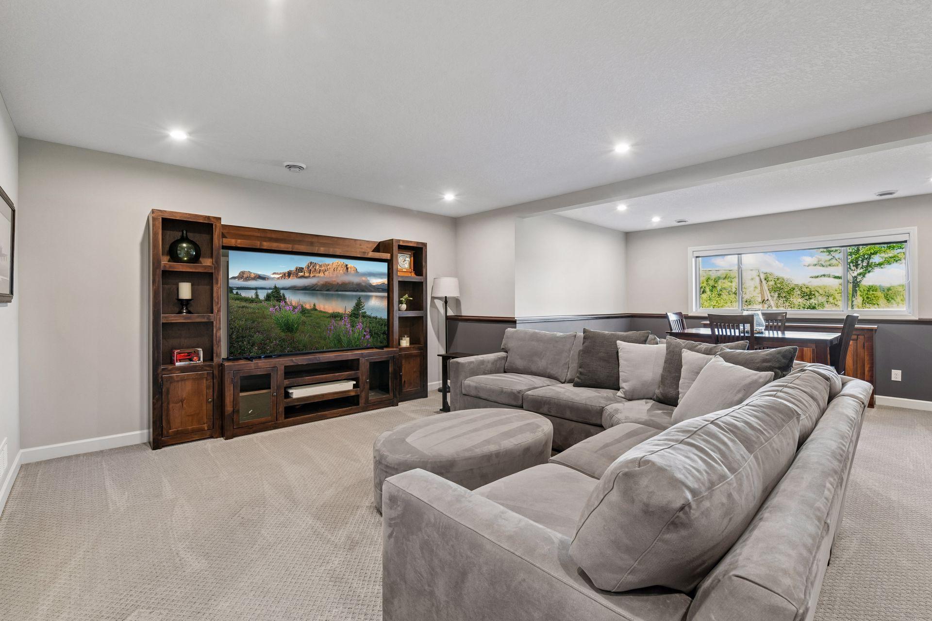 The living spaces are extended into the lower level where you will find a second family room - perfect for movie night!