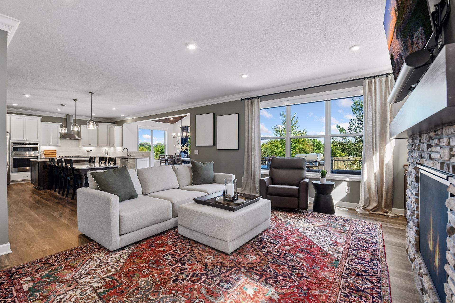 The main level of the home has been upgraded with custom crown molding. The spaces flow naturally from one room to the next, creating an easy, connected feel throughout.