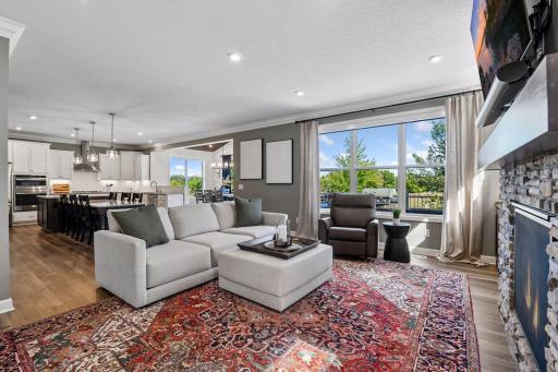 The main level of the home has been upgraded with custom crown molding. The spaces flow naturally from one room to the next, creating an easy, connected feel throughout.