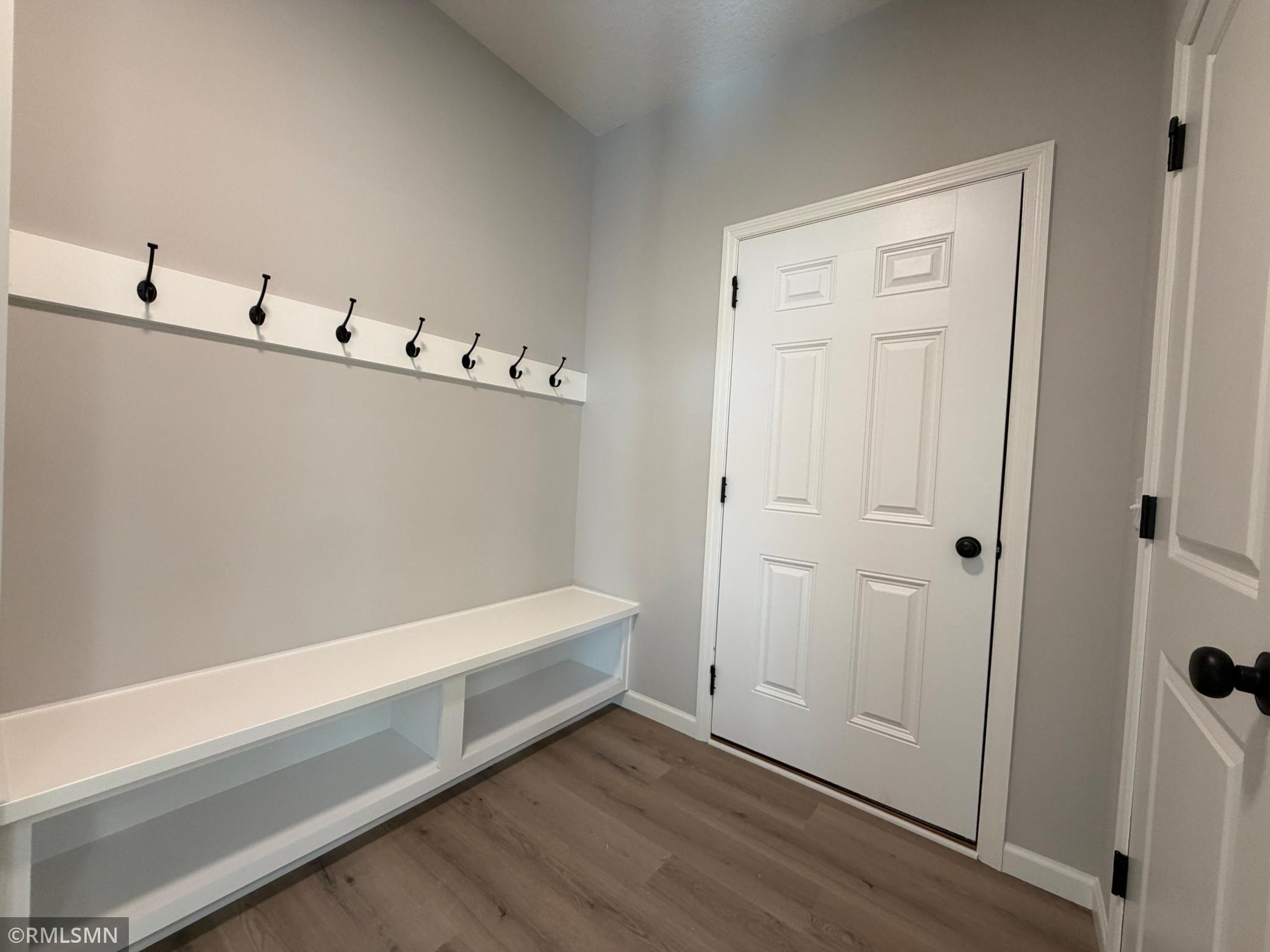 Mudroom with built in boot bench