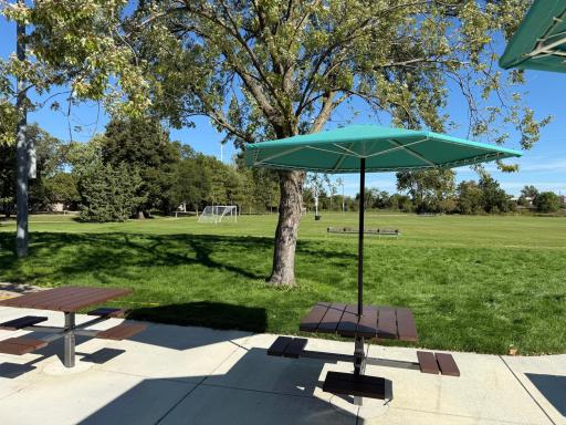 8+ acres park with soccer fields, playground, tennis, and new splash pad coming in 2027!