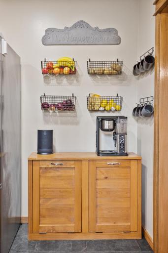 Thoughtful storage continues with a dedicated area perfect for a coffee bar, pantry overflow or everyday essentials.