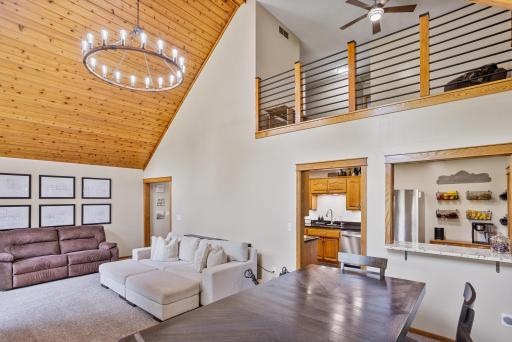 An open upper-level loft overlooks the great room and offers flexible space for a home office, reading nook or additional living area.
