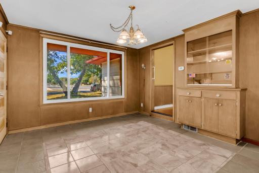 dining area looks out over the front and rear of home