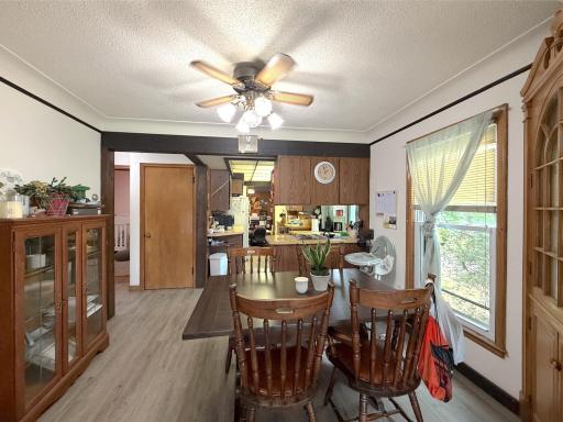 Dining room flows easily between the kitchen and living room, creating a comfortable space for everyday meals and gatherings.