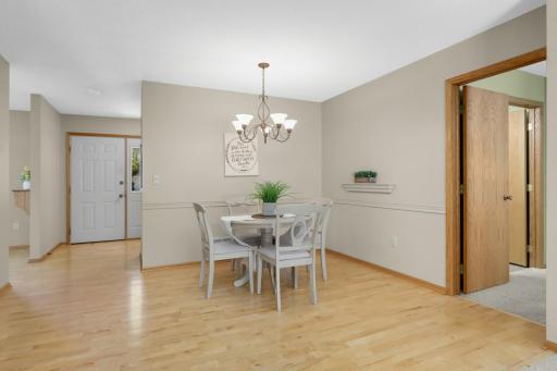 Dining Room with maple hardwood floors and plenty of room for a larger table.