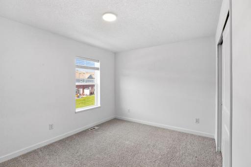 The upper-level secondary bedrooms are perfectly situated away from the downstairs main living areas.