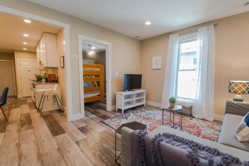 2nd view of living room to open kitchen.jpg