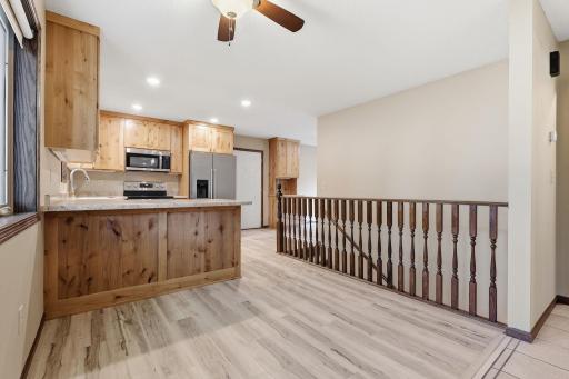 NEW Alder cabinetry and stainless steel appliances