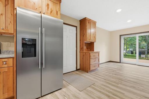 NEW Alder cabinetry and stainless steel appliances