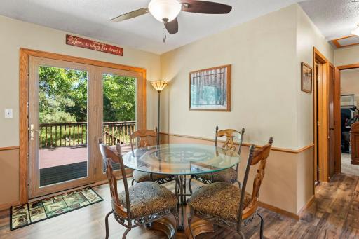 Dining area leads out to beautiful deck and backyard through the patio door