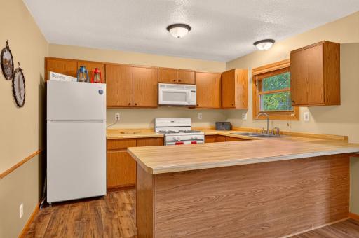 Nicely sized kitchen with lots of storage space.