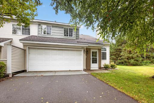End-unit townhome in a convenient Eagan location with added natural light and green space.