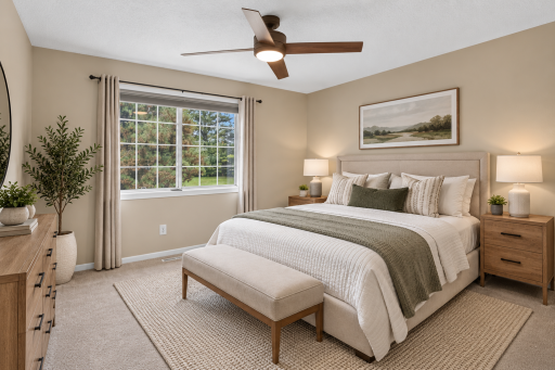 Comfortable primary bedroom with walk-in closet and convenient bathroom access. Digitally Staged
