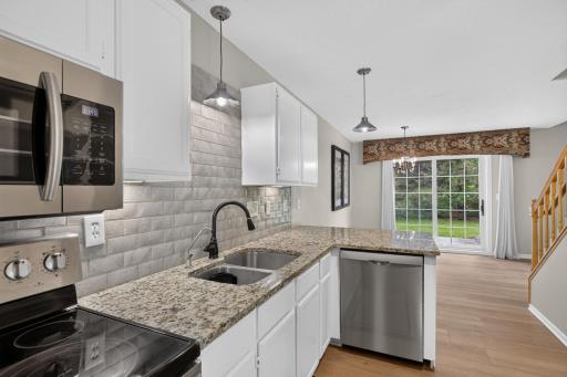 pen kitchen connects easily to the dining and living spaces.