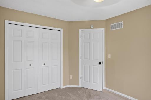 Bright second bedroom offers comfortable guest or additional living space.