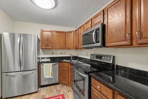 Updated kitchen with new stainless steel applainaces and granite countertops.