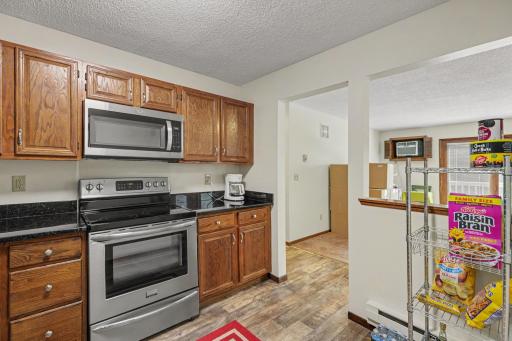 Stainless steel appliances and granite countertops.