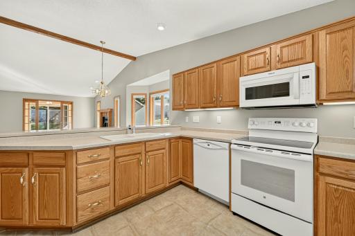 Ample countertop space with breakfast bar seating