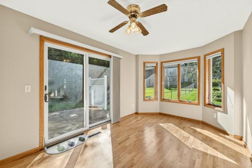 Inviting sunroom with green views