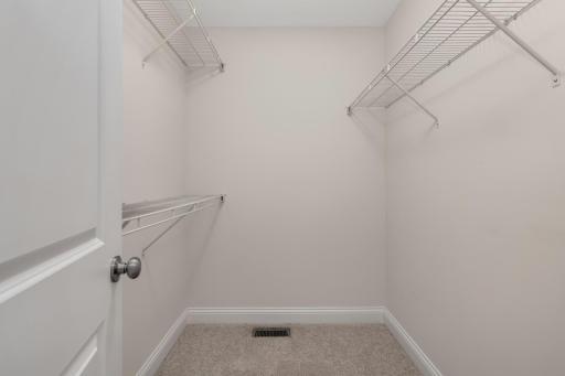 Large walk-in closet with ample storage and organization space.