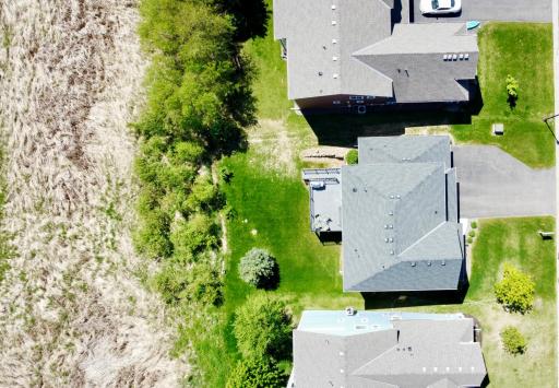 Thoughtfully positioned lot with open space behind, offering a sense of privacy and room to enjoy