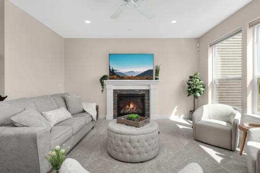 Inviting living room featuring gas fireplace and comfortable seating area.