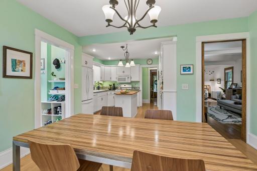 Another look at the dining room and kitchen, highlighting their access to both the mudroom and living room.