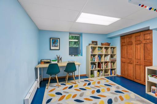 FUN lower level offers a neat fifth bedroom.