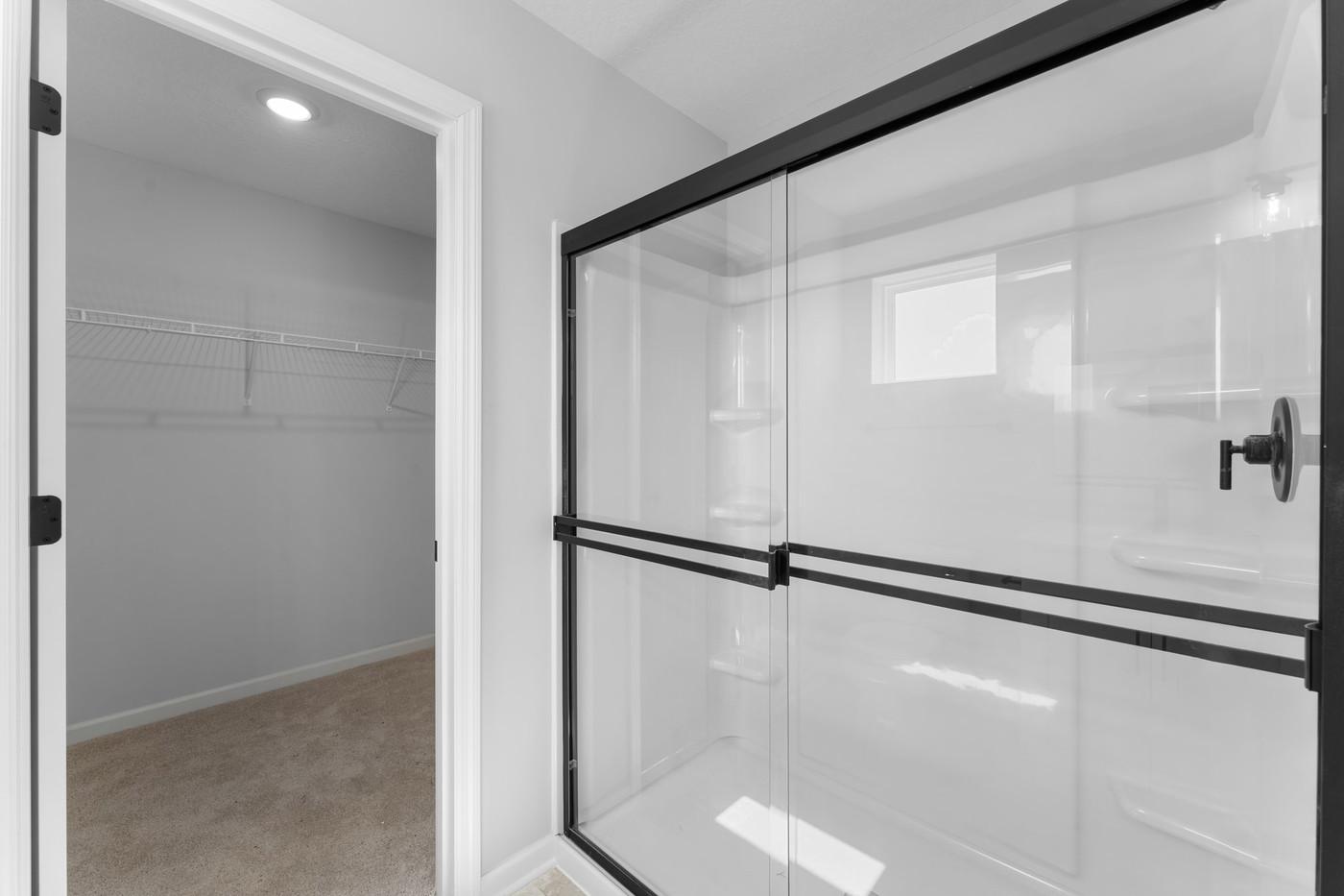 Primary bathroom and walk-in closet