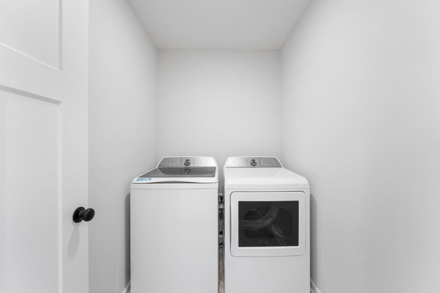 Upstairs laundry room - includes washer/dryer