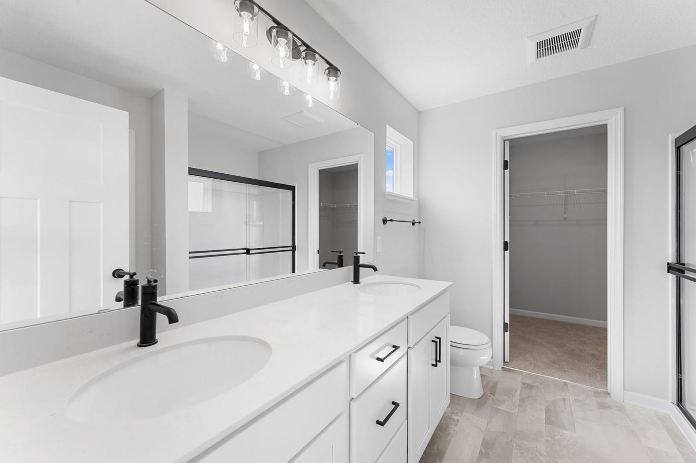 Owner's Bathroom with dual vanity