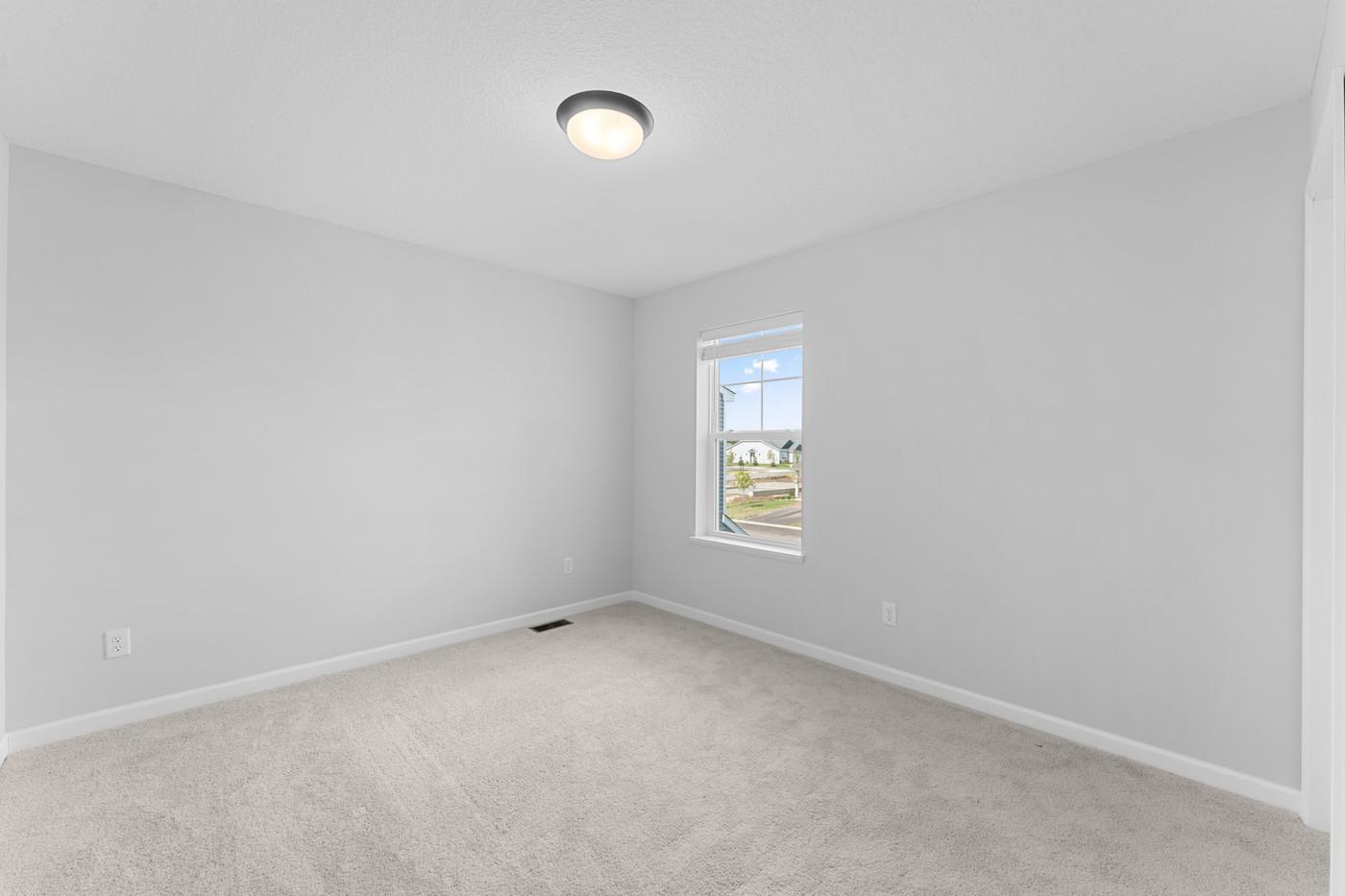One of 4 upstairs Bedrooms, each with it's own WALK-IN CLOSET1