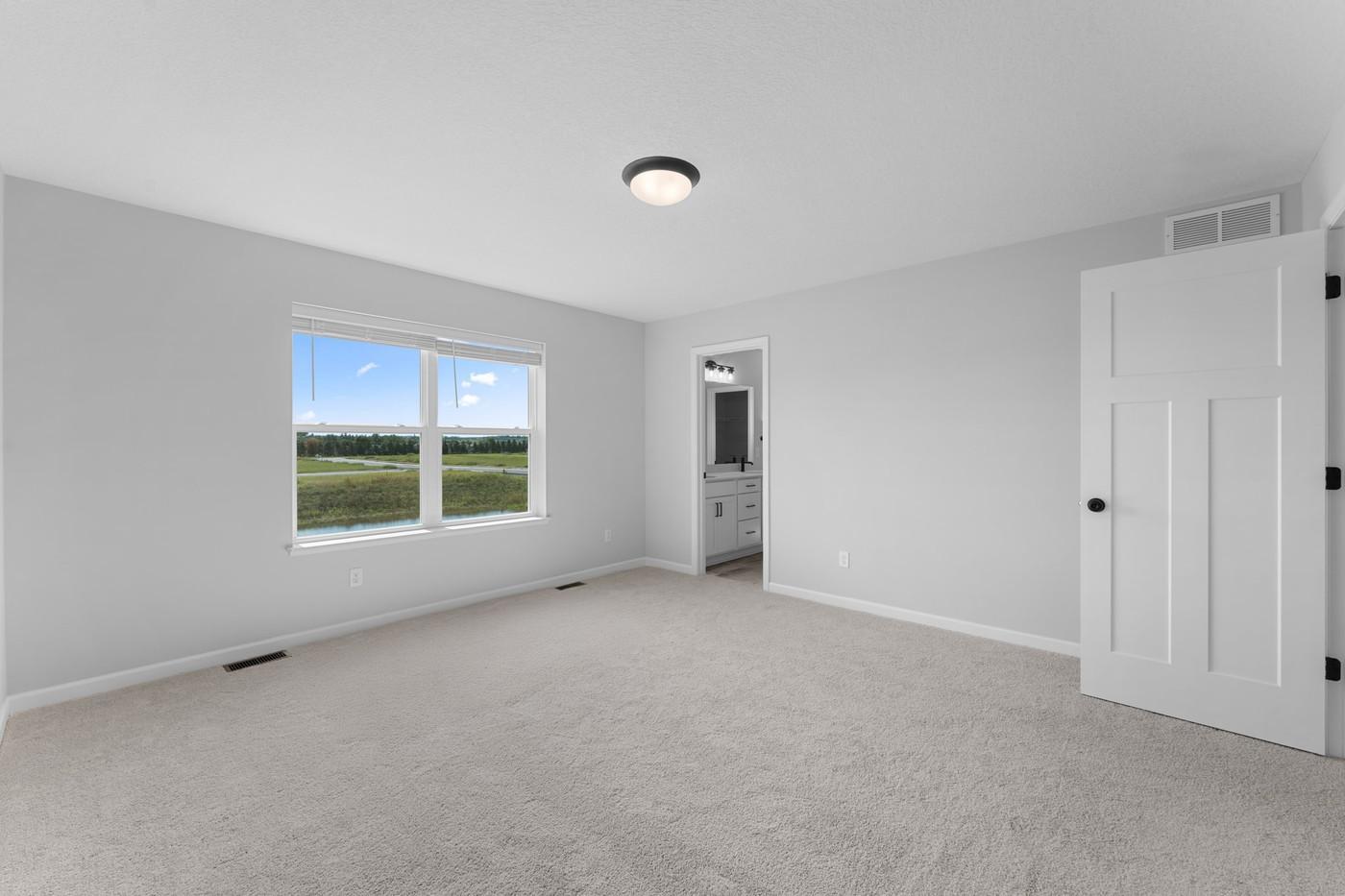 Upstairs Primary Bedroom en-suite! Amazing views! Actual pic!