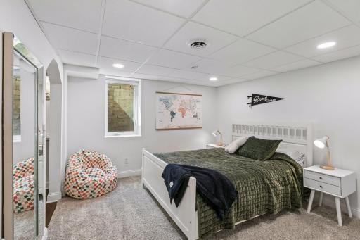 Large basement bedroom perfectly setup for primary or guest suite. Egress windows and walk-in closet!