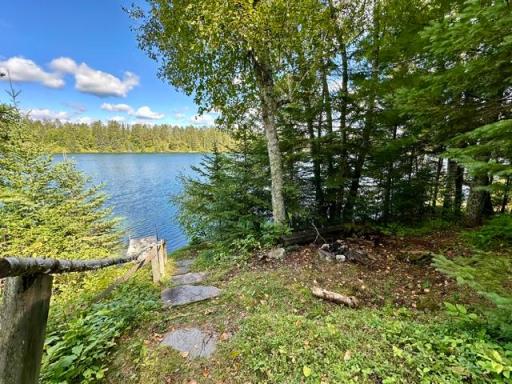 Firepit and steps to the lake